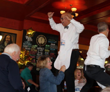 Celebrity waiters raised extra money for the cause!