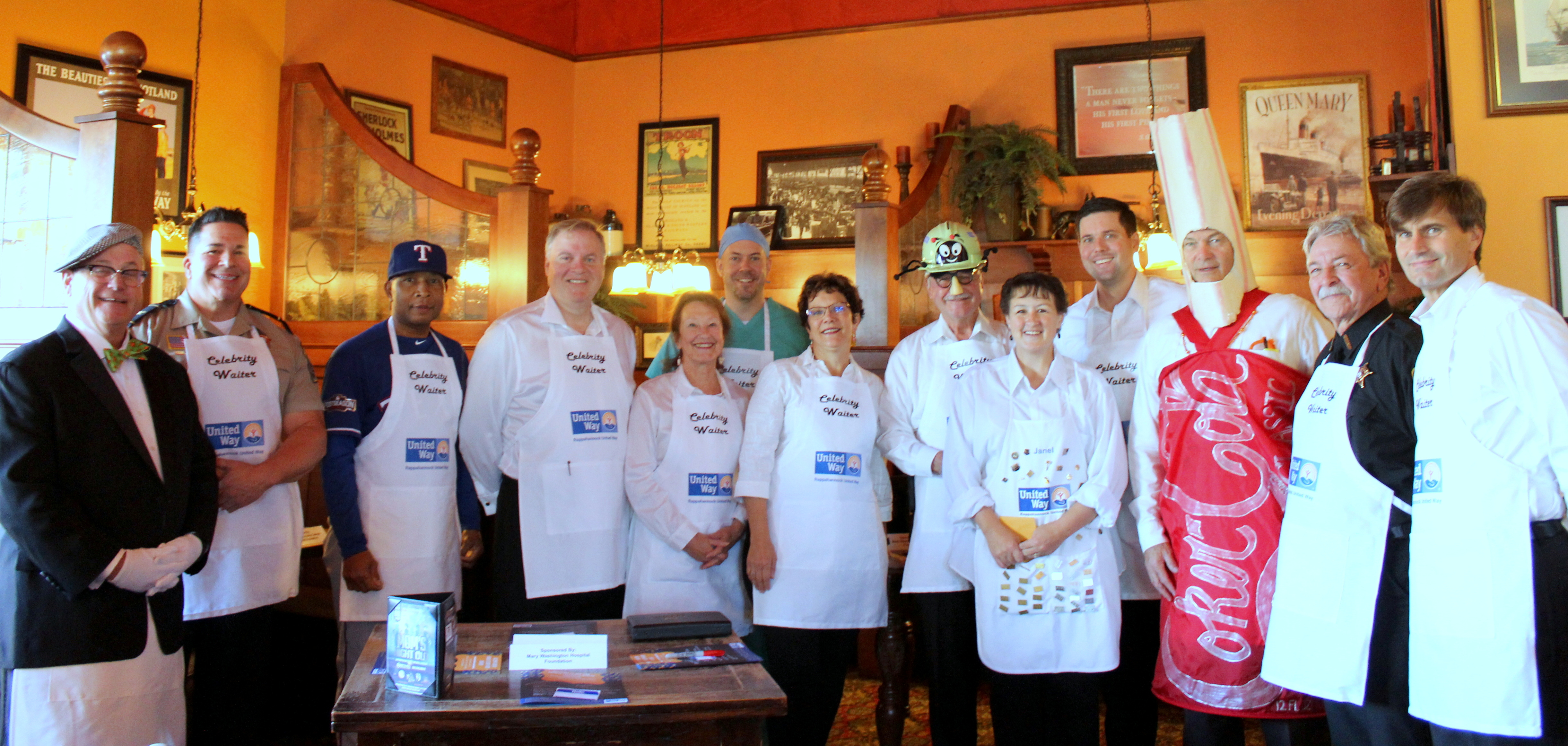 group photo of celebrity waiters