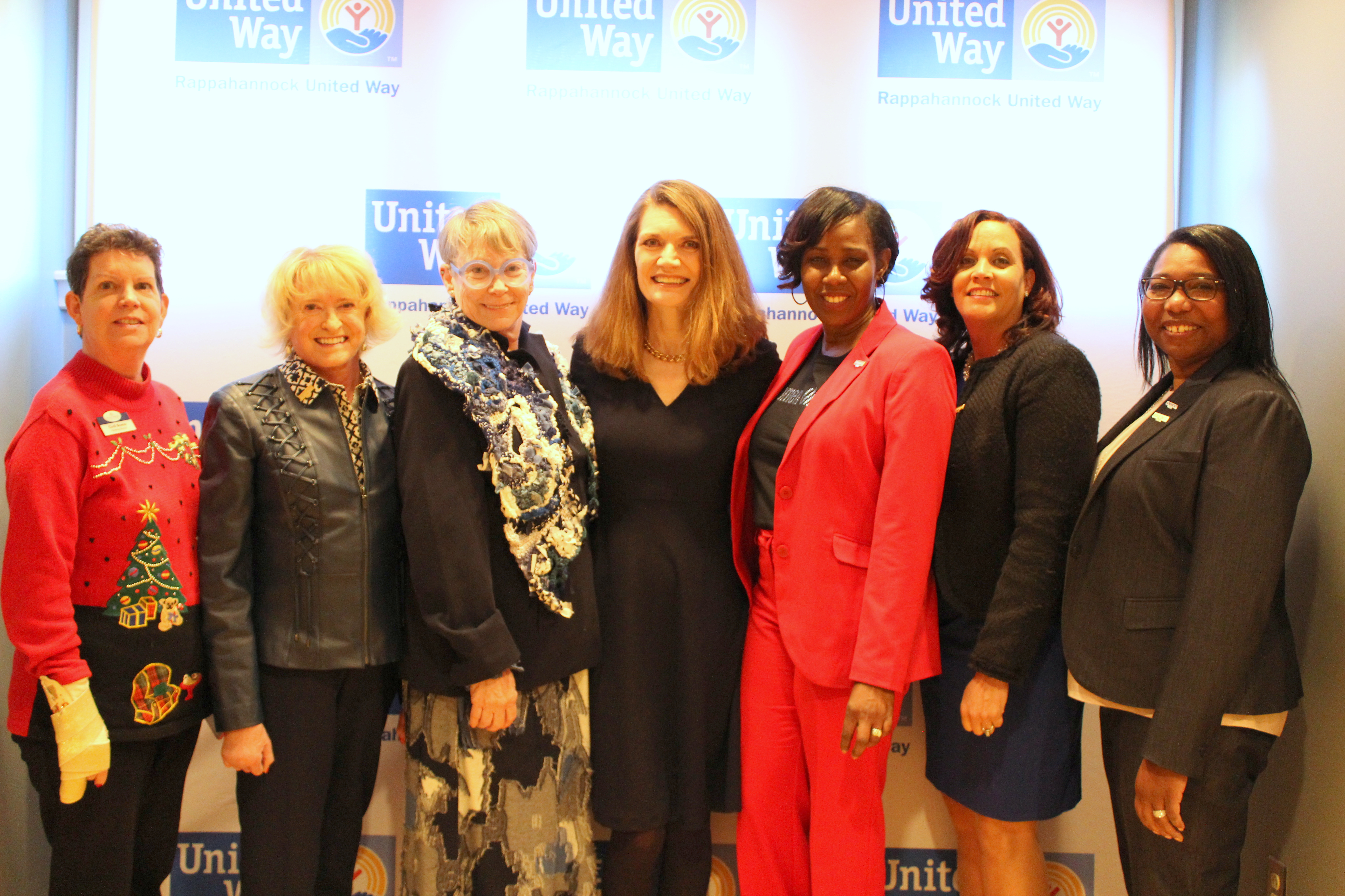 Author Jeanette Walls poses with members of the Rappahannock United Way leadership council